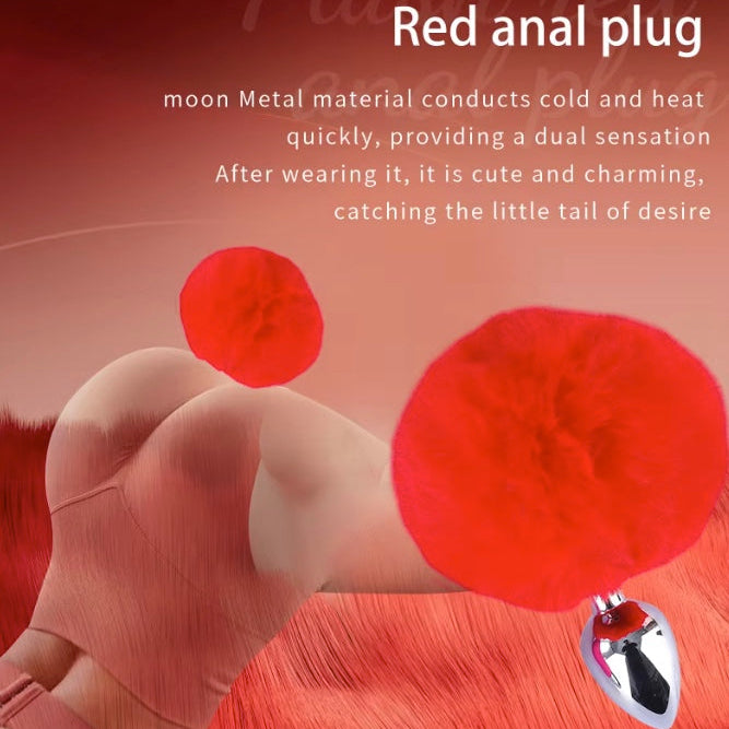 Red anal plug with text on a red background NUNI X