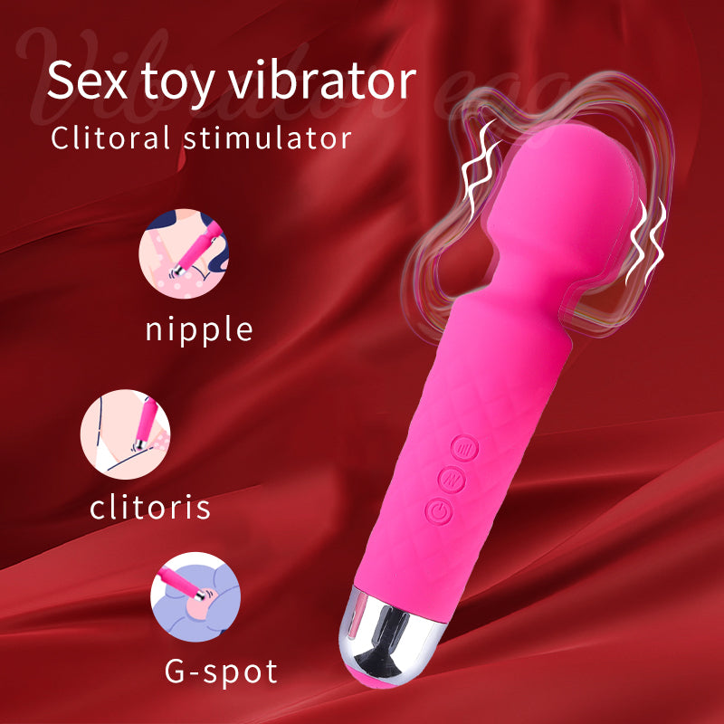 Pink sex toy vibrator with labeled parts on a red background NUNI X